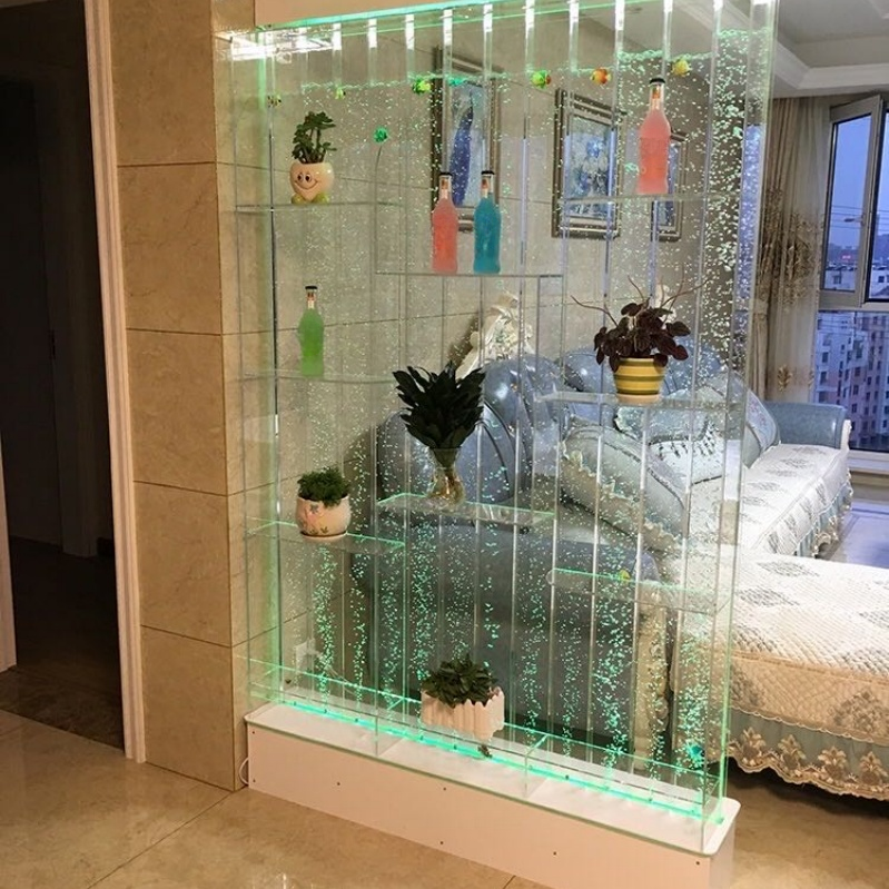 Glass partition with decorative items in a living room setting